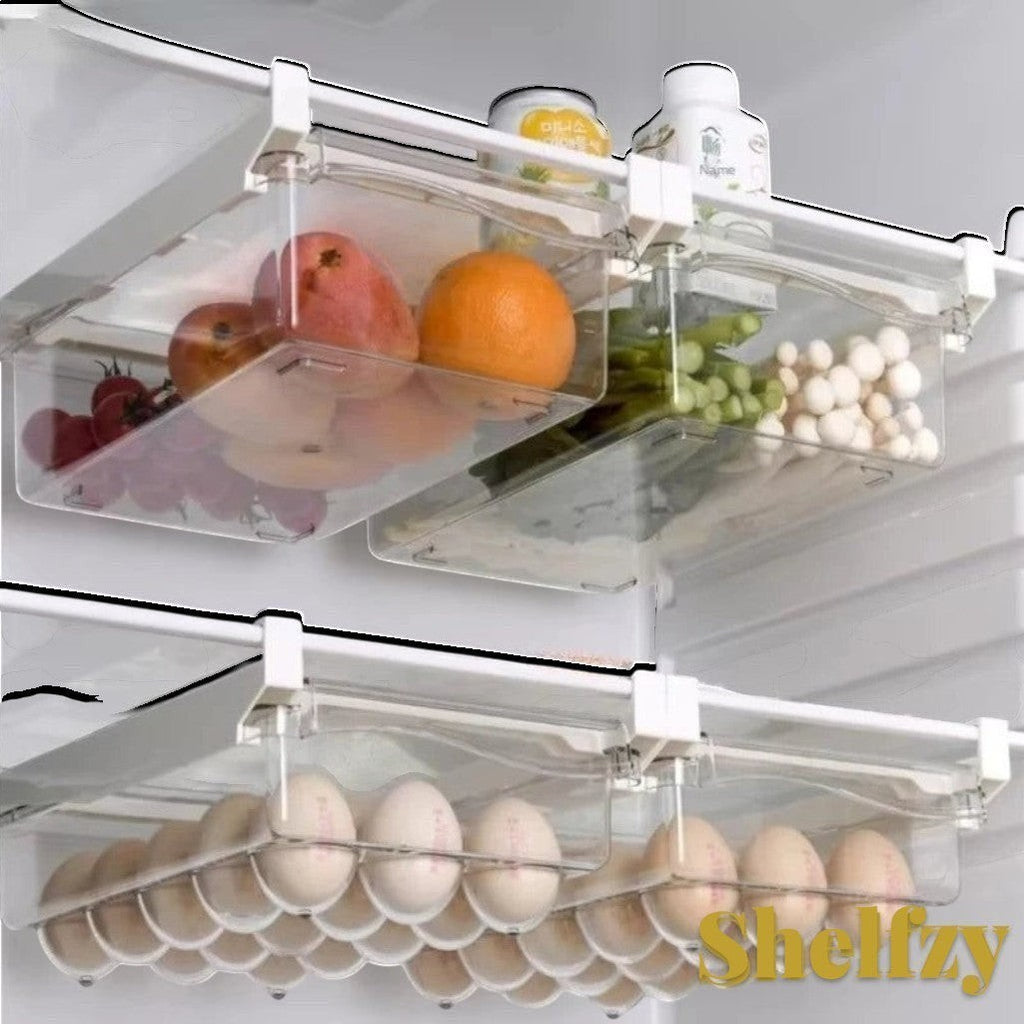 Gr8est Shelfzy clear plastic under-shelf fridge drawer organizers holding fresh produce and eggs in a refrigerator.