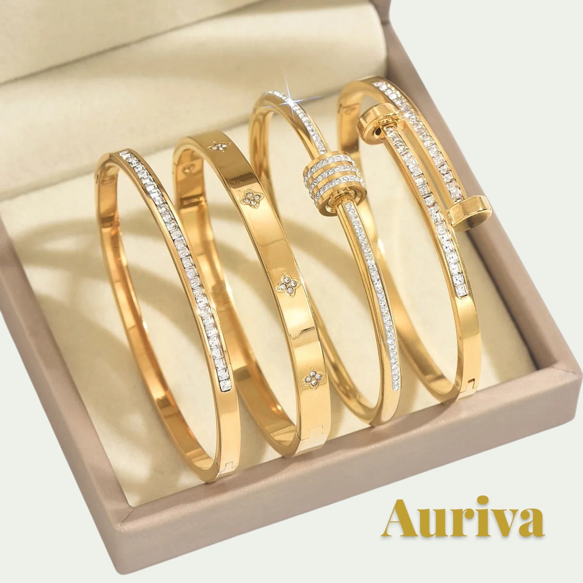 Gr8est Auriva gold titanium steel stacked bangle set featuring cubic zirconia pave and flower-inspired motifs.