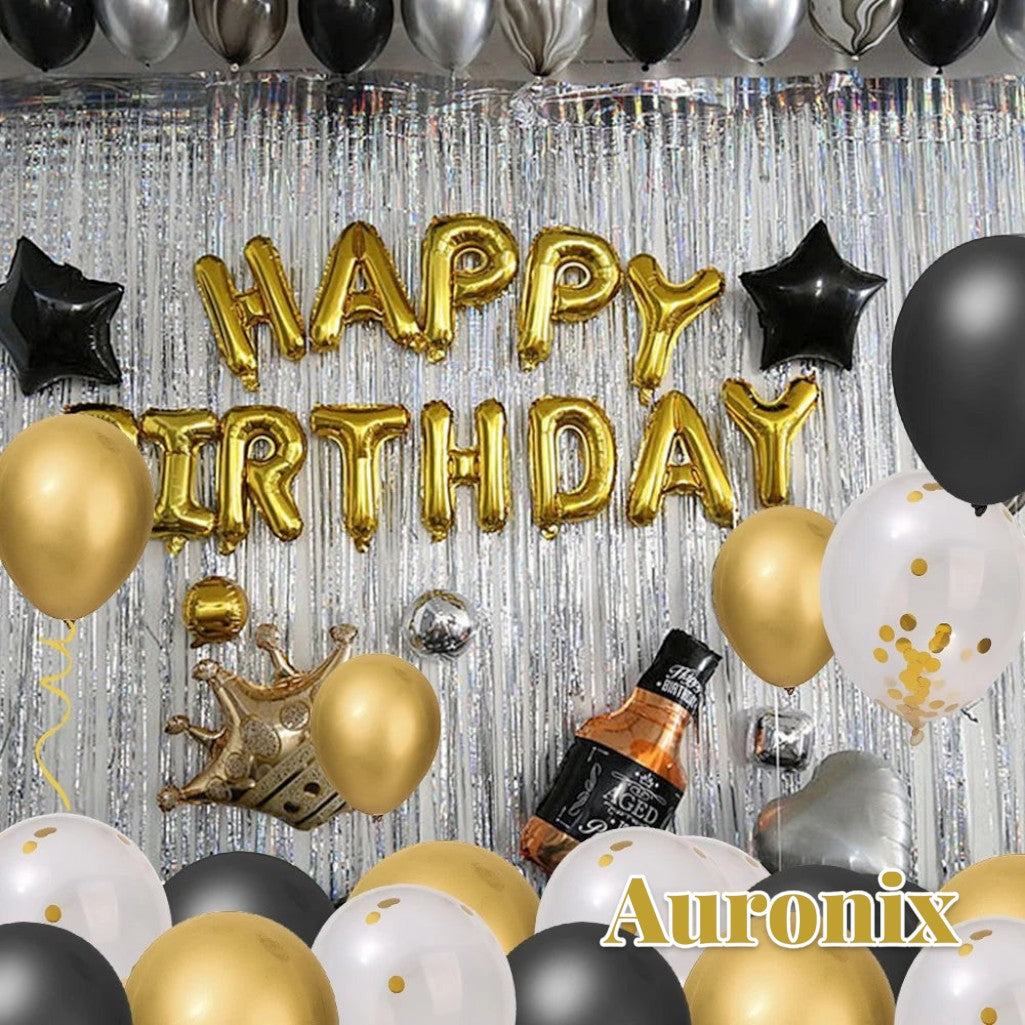 Gr8est Auronix gold and black latex balloons with confetti, featuring Happy Birthday foil balloons and silver fringe.