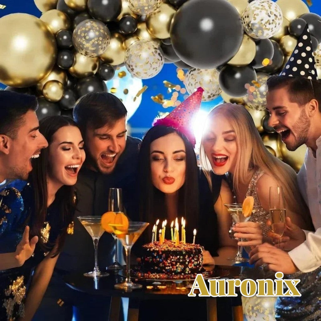 Gr8est Auronix gold and black confetti latex balloons decorating a festive birthday party with friends