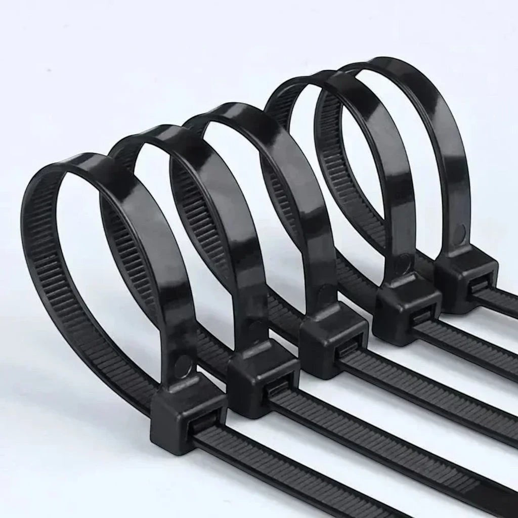 Gr8est BindPro black nylon self-locking cable ties arranged in a row for wire and cable organization.