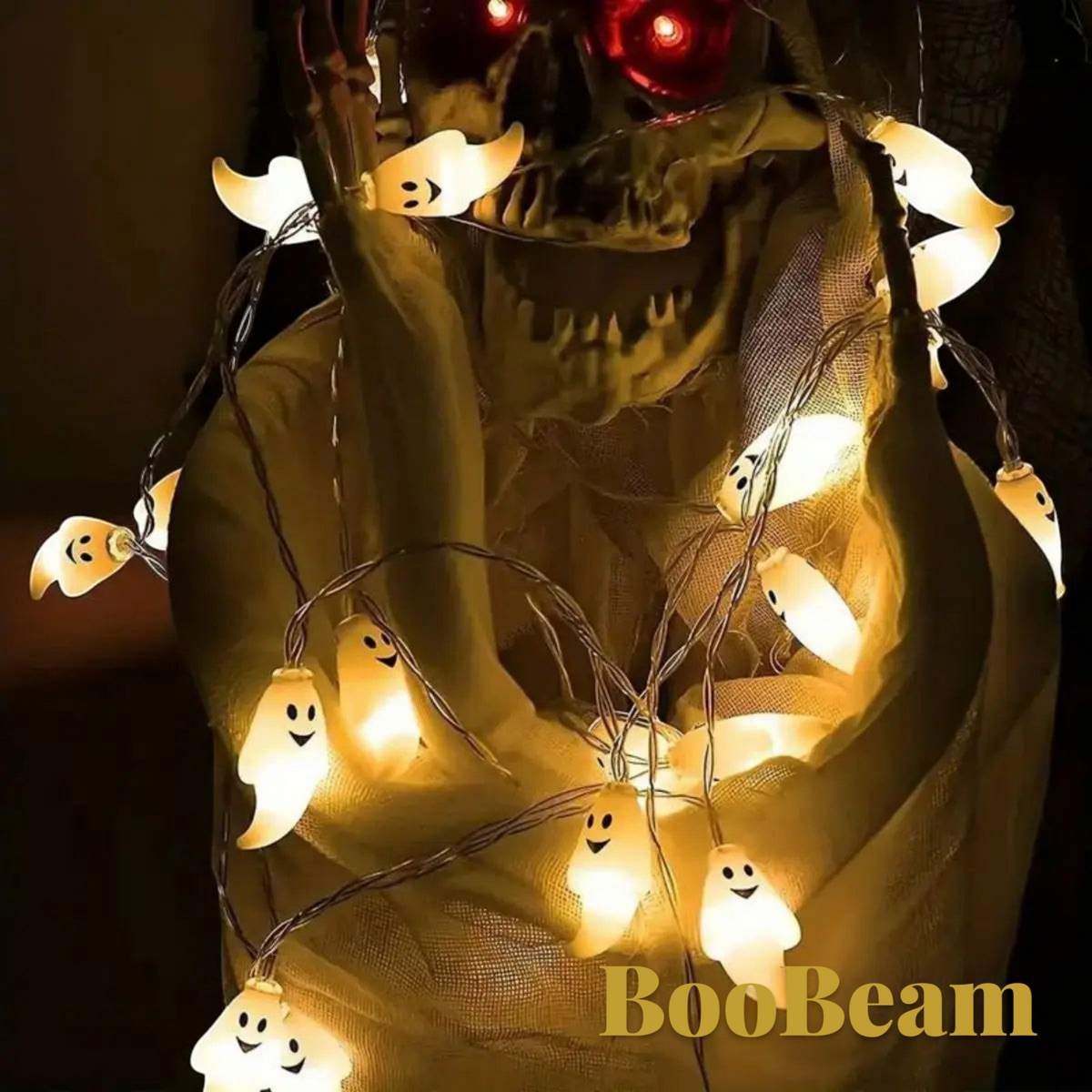 Gr8est BooBeam ghost string lights with warm white LED glow draped over a spooky skeleton Halloween decoration