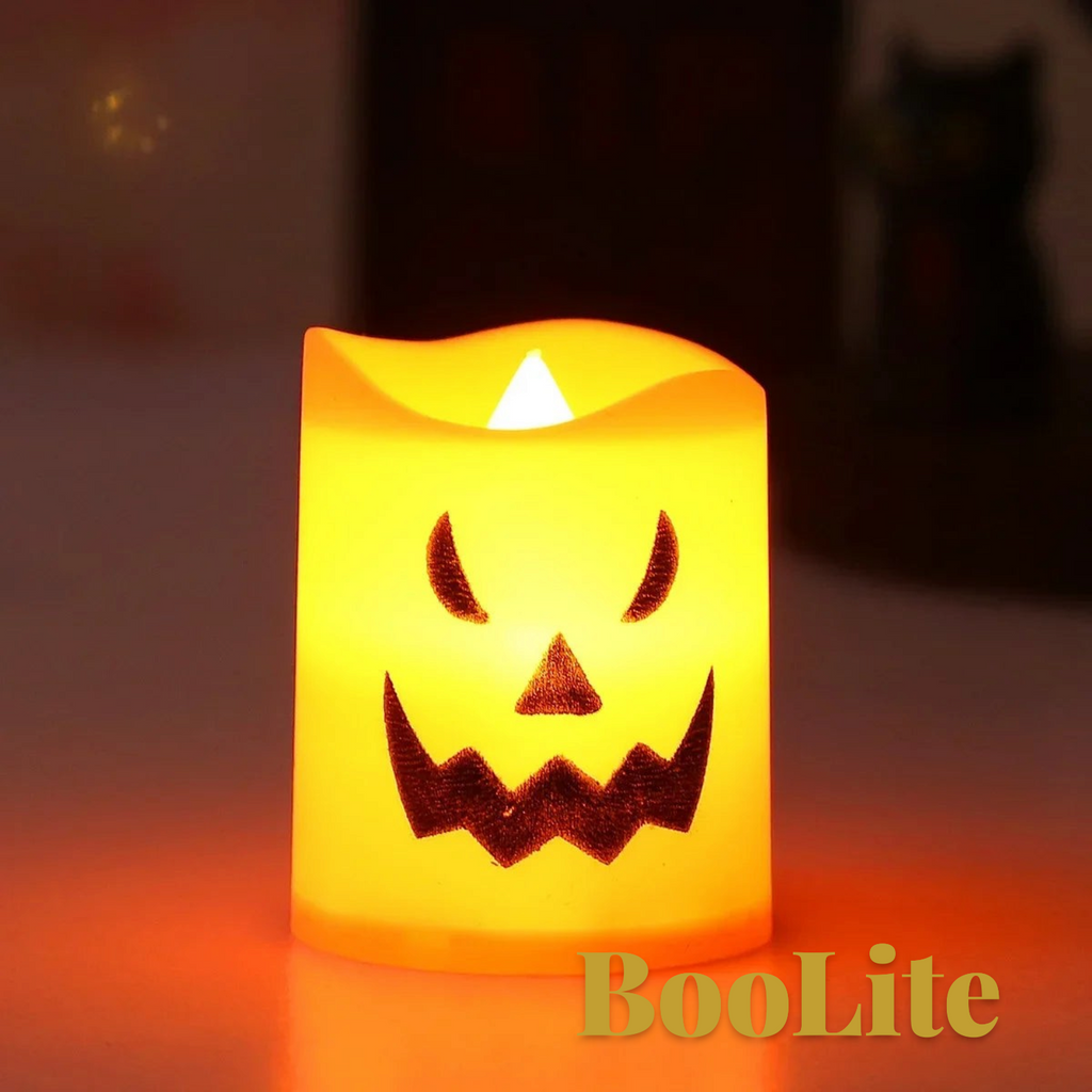 Gr8est BooLite orange LED flameless candle with a spooky jack-o-lantern face for Halloween party decor