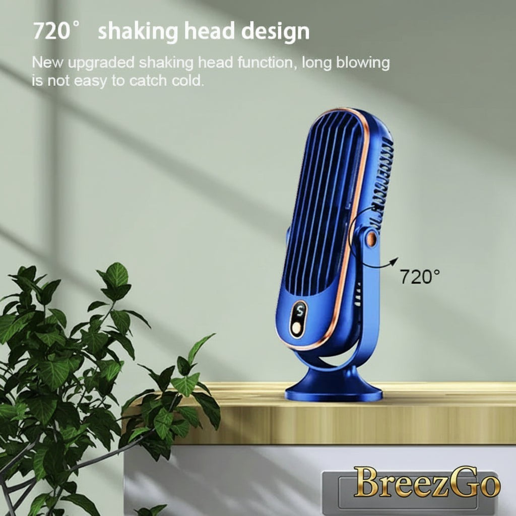 Gr8est BreezGO rechargeable portable fan in blue with 720-degree swivel head design on a wooden desk surface.