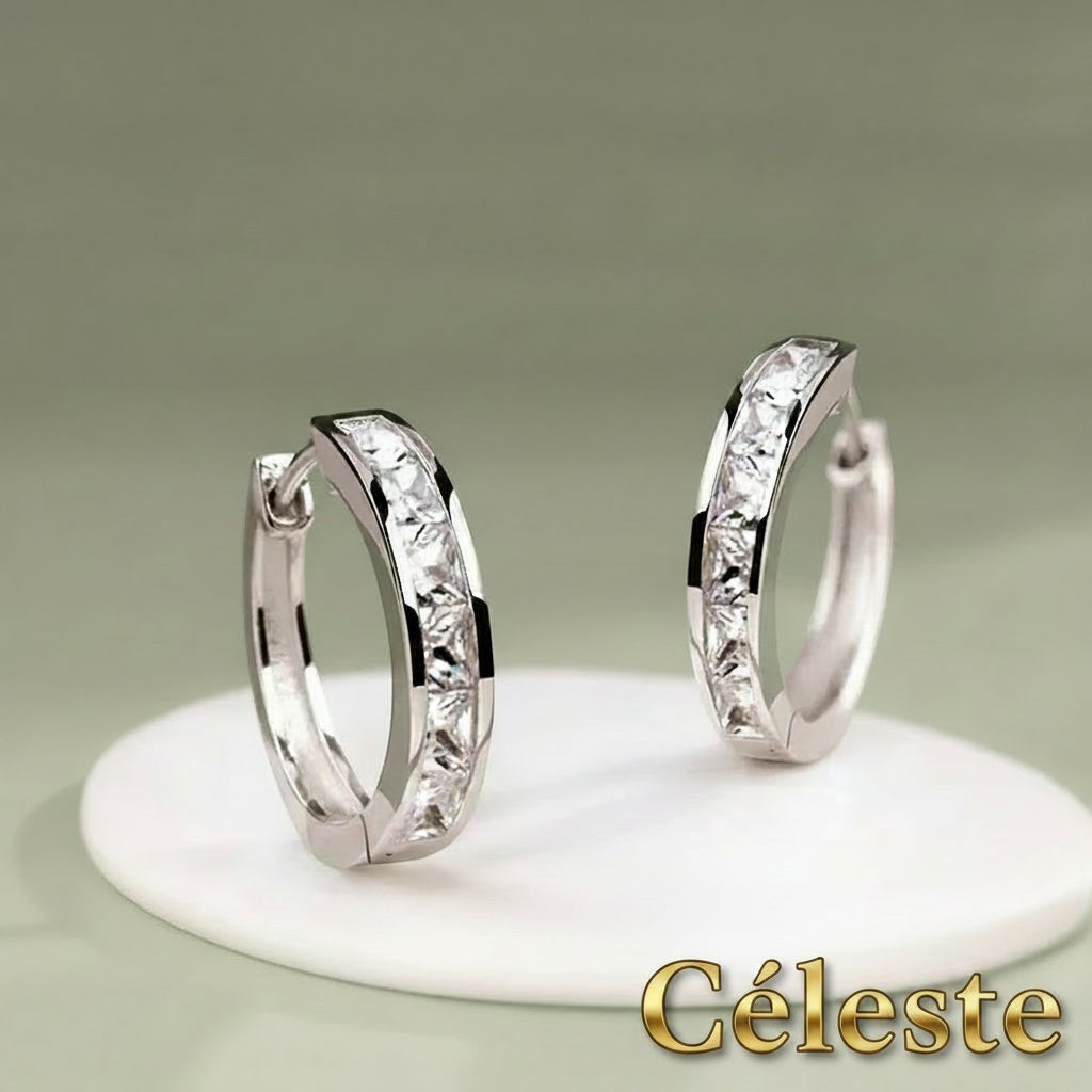 Gr8est Céleste hoop earrings featuring princess-cut cubic zirconia stones in a sleek silver-tone geometric design.
