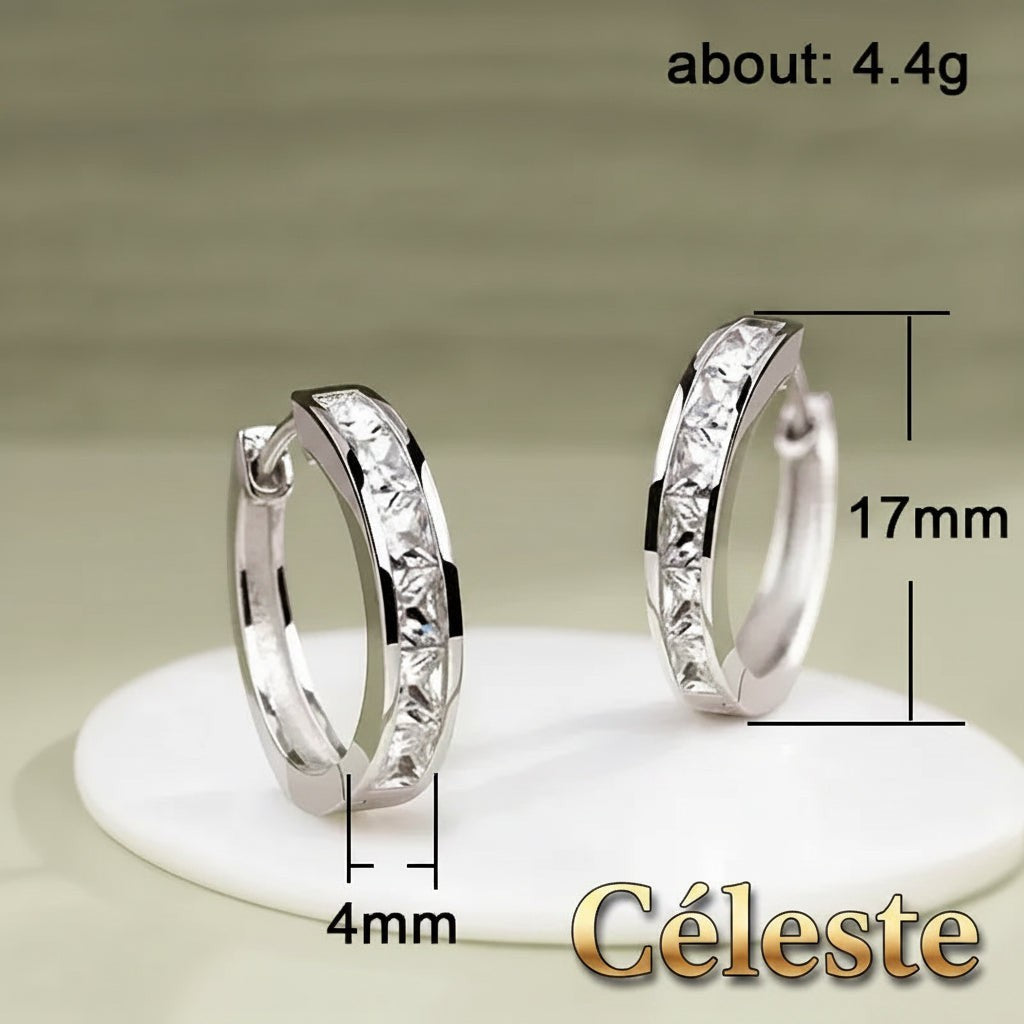Gr8est Céleste hoop earrings featuring princess-cut cubic zirconia stones in a silver-tone geometric zinc alloy setting.