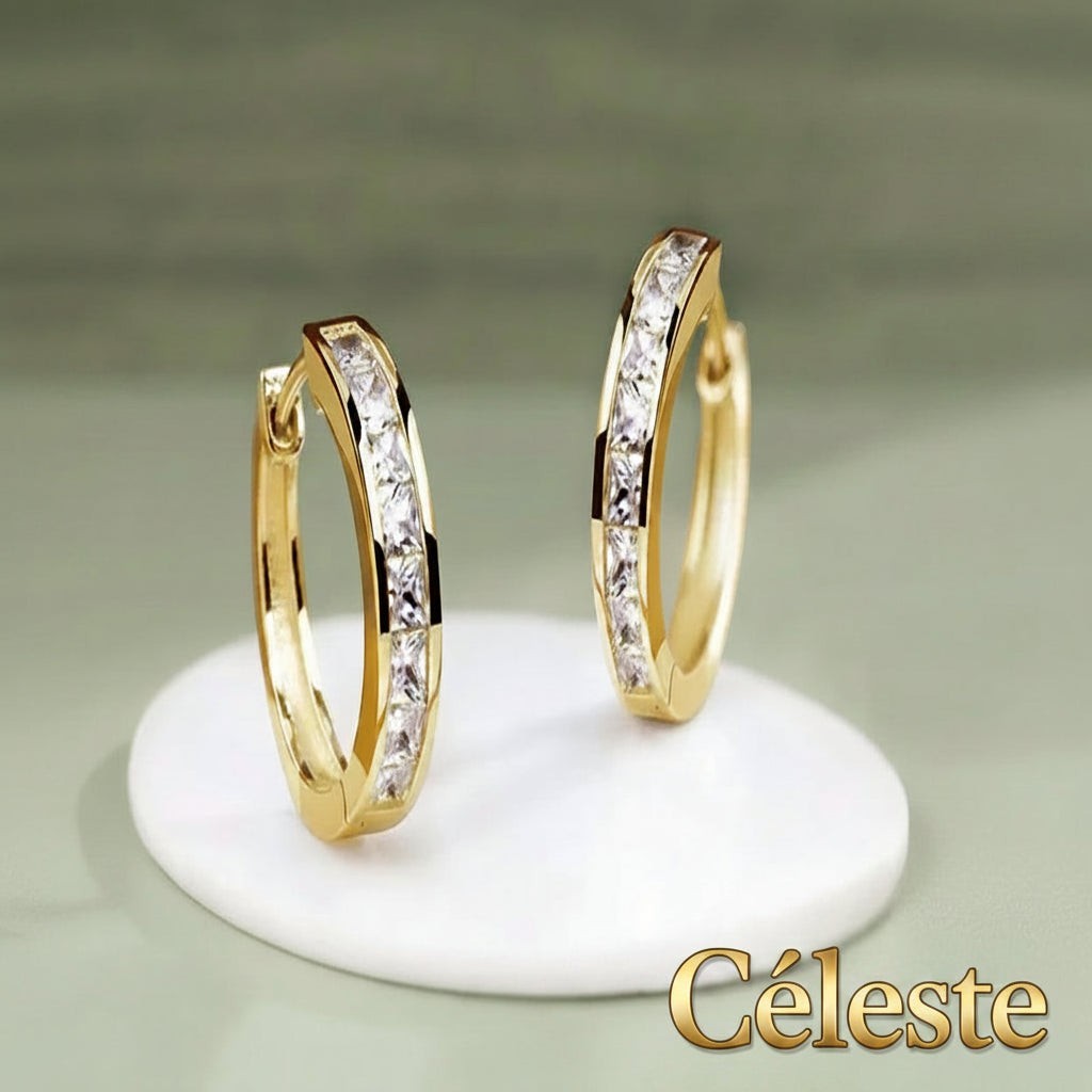 Gr8est Céleste gold-tone hoop earrings featuring princess-cut cubic zirconia stones in a sleek geometric design.
