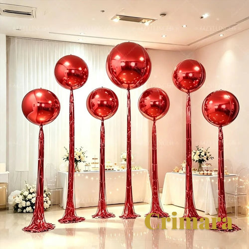 Gr8est Crimara red 4D round rainsilk foil balloons with a glossy finish displayed as elegant party floor decorations.