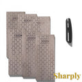 Gr8est diamond sharpening stone set with six different grit plates featuring a honeycomb pattern and a black guide.