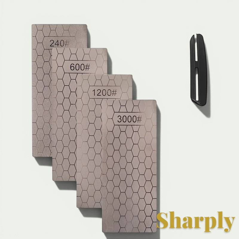 Gr8est diamond sharpening stone set with four different grits featuring a hexagonal pattern and a black guide tool