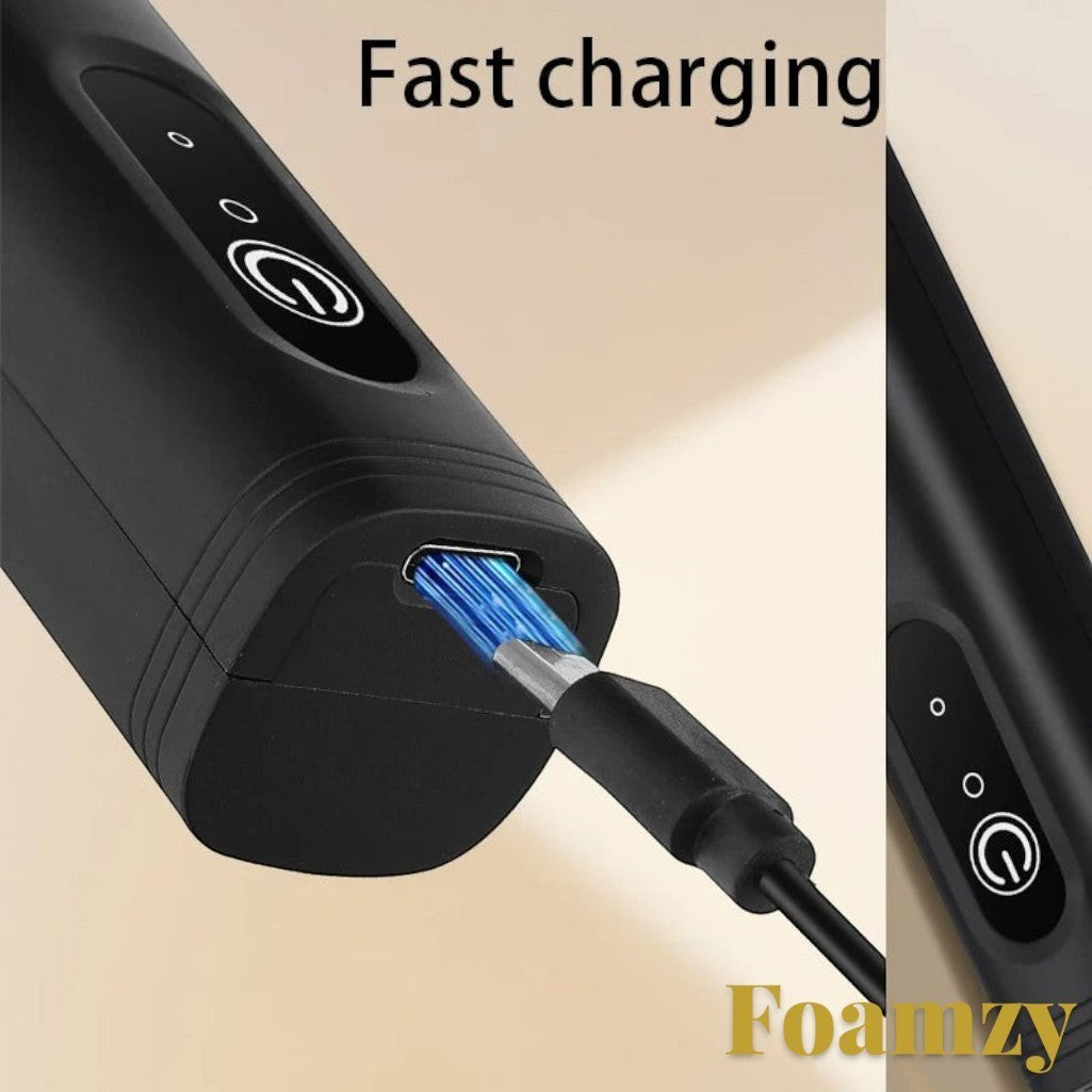 Gr8est Foamzy electric milk frother handheld device being charged with a USB cable showing fast charging feature