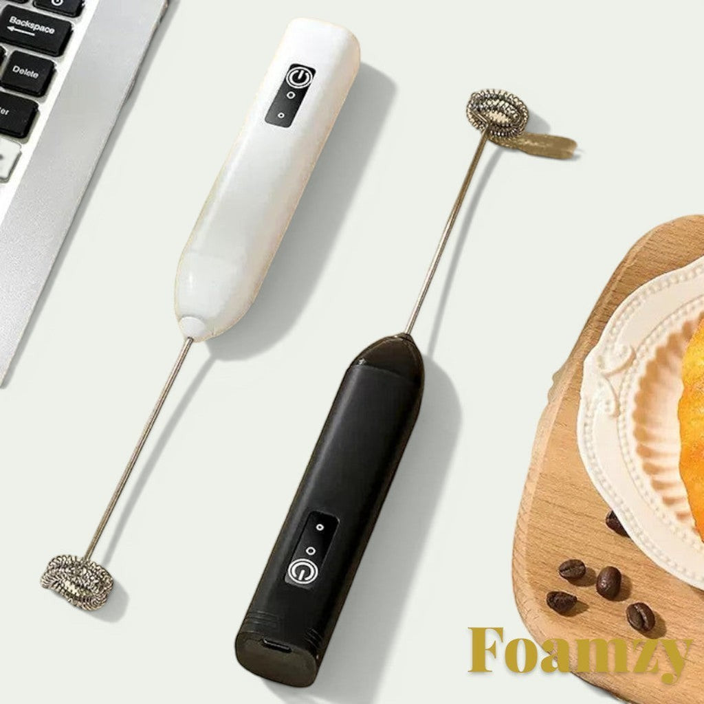 Gr8est Foamzy electric handheld milk frothers in black and white for coffee, lattes, and egg beating.