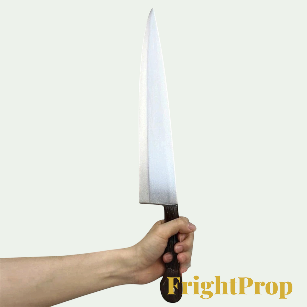 Gr8est FrightProp soft PU rubber knife costume prop held in a hand for Halloween cosplay and role playing.