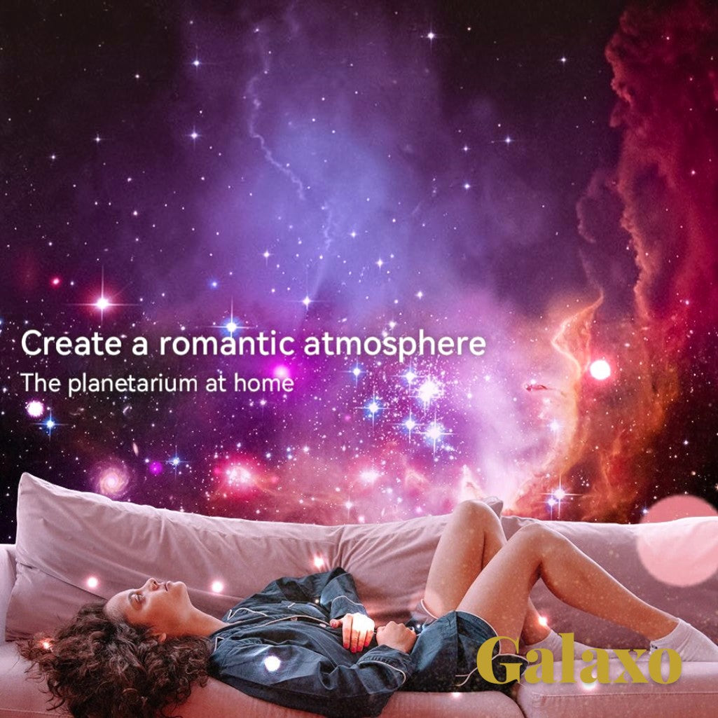 Gr8est Galaxo 12-in-1 HD galaxy projector creating a vibrant purple and orange nebula projection above a relaxing woman