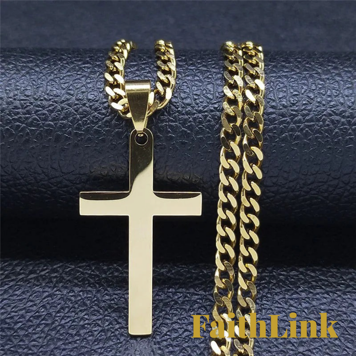 Gr8est FaithLink gold-tone stainless steel cross pendant necklace with a thick curb link chain on a black background.