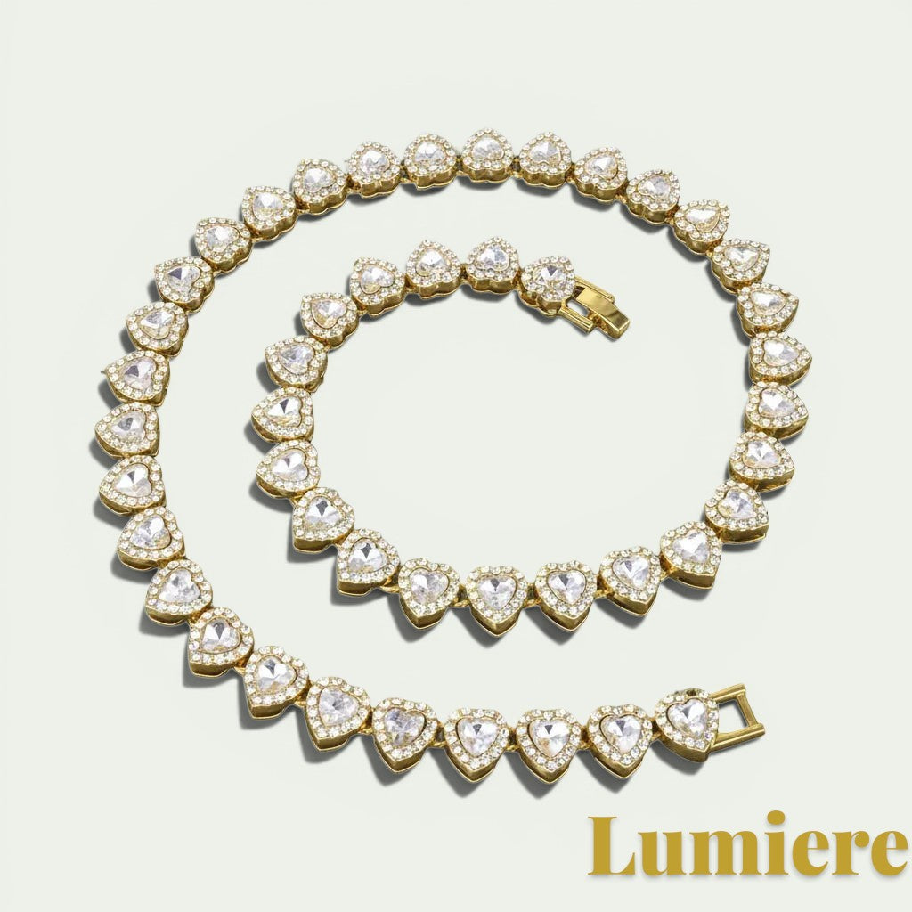 Gr8est gold-tone tennis necklace featuring a continuous row of sparkling heart-shaped rhinestones in zinc alloy