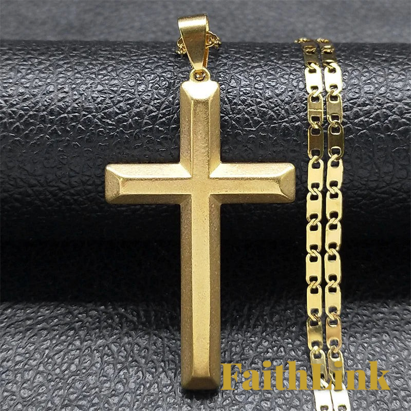 Gr8est gold-tone stainless steel cross pendant necklace with a polished link chain on a black textured background.
