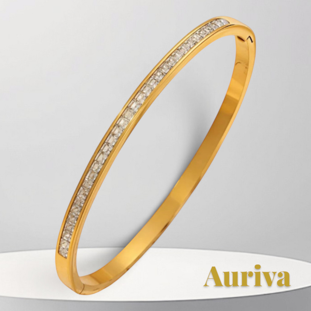 Gr8est gold stainless steel bangle bracelet featuring a row of sparkling zircon stones for a luxury look.