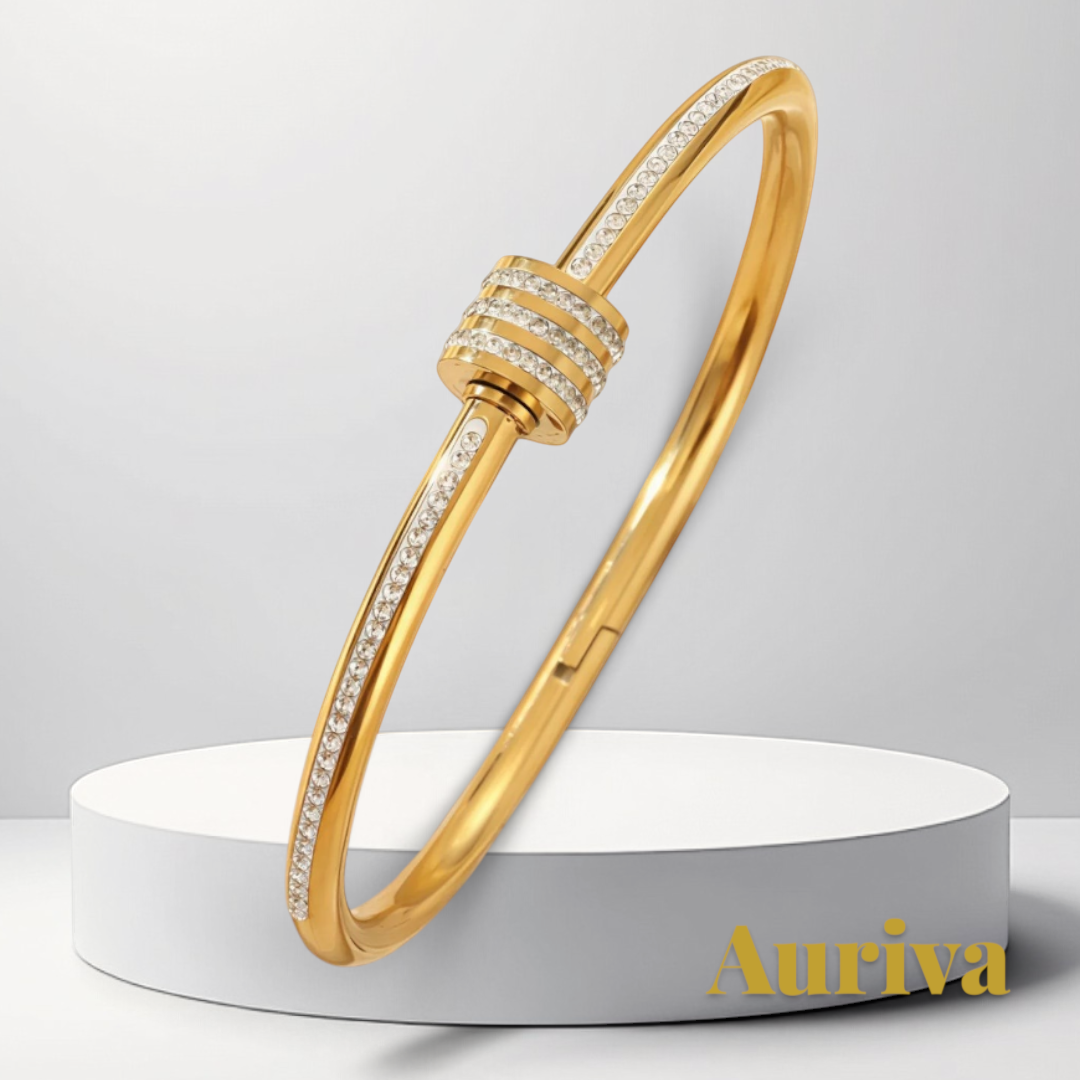 Gr8est gold stainless steel bangle bracelet featuring sparkling zircon stones and a central Roman numeral design
