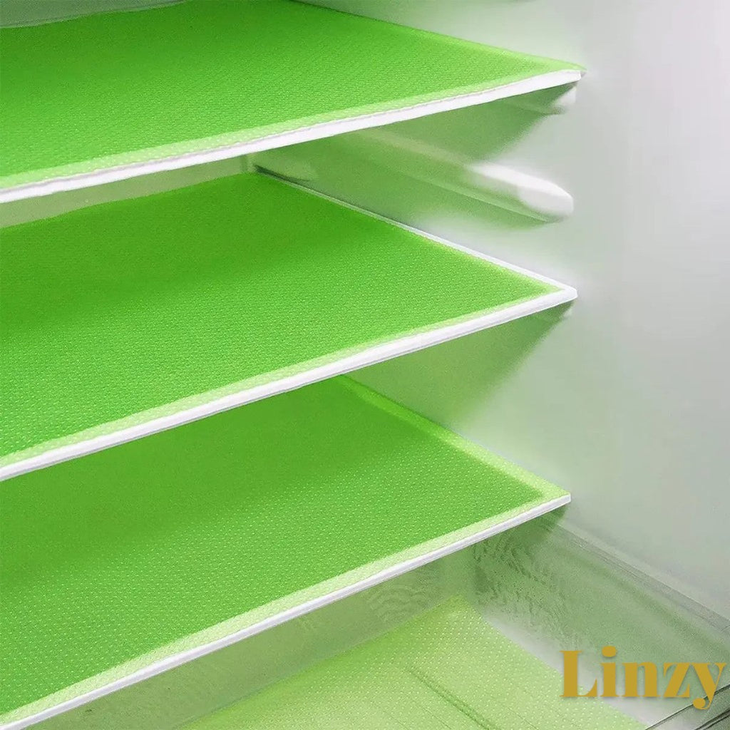 Gr8est green waterproof EVA fridge shelf liner mats installed on refrigerator shelves for easy cleaning.