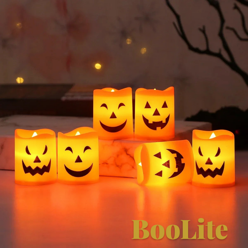 Gr8est set of six orange-yellow plastic LED Halloween candles with spooky jack-o-lantern faces for party decor