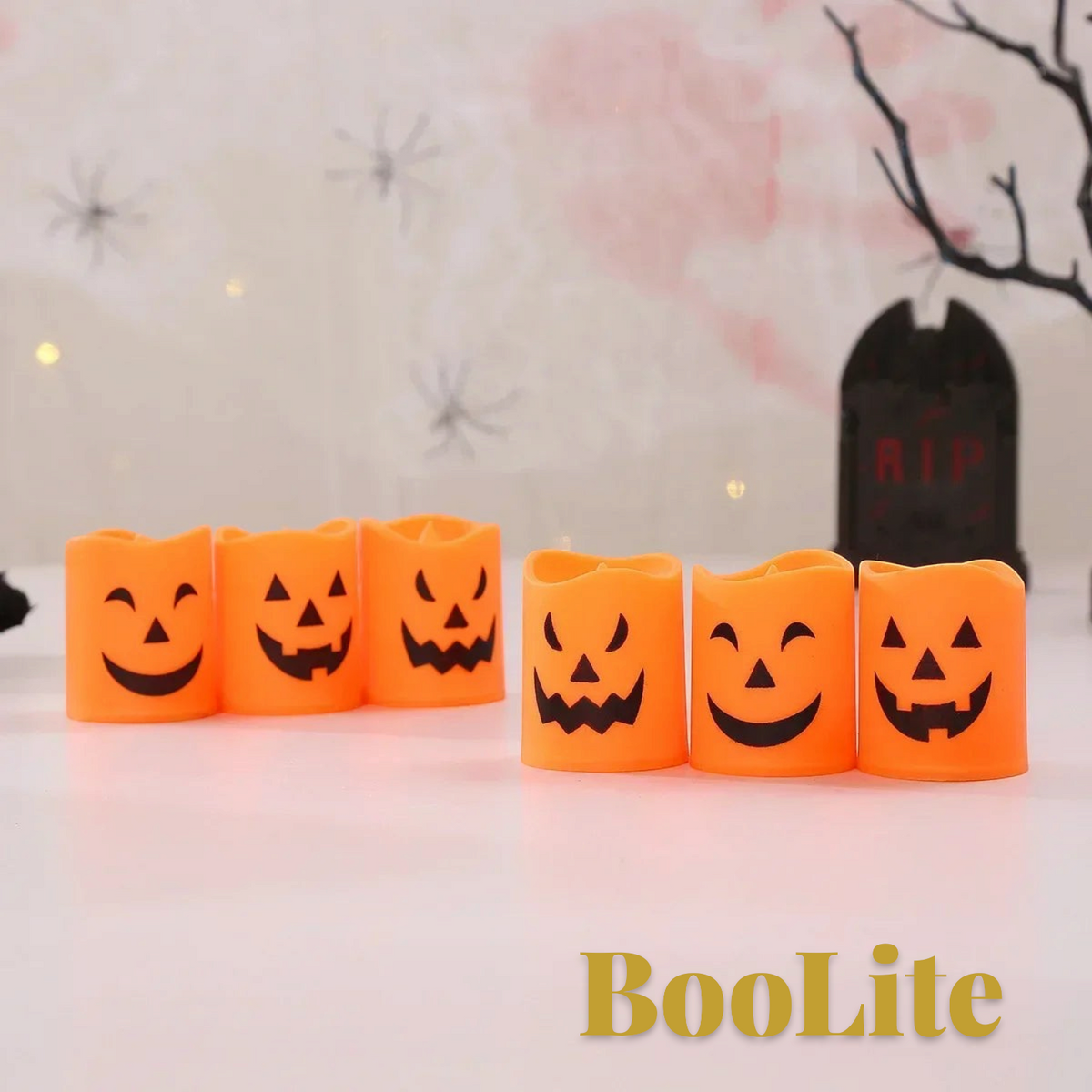 Gr8est set of six orange plastic LED Halloween tea light candles with spooky jack-o-lantern faces for party decor