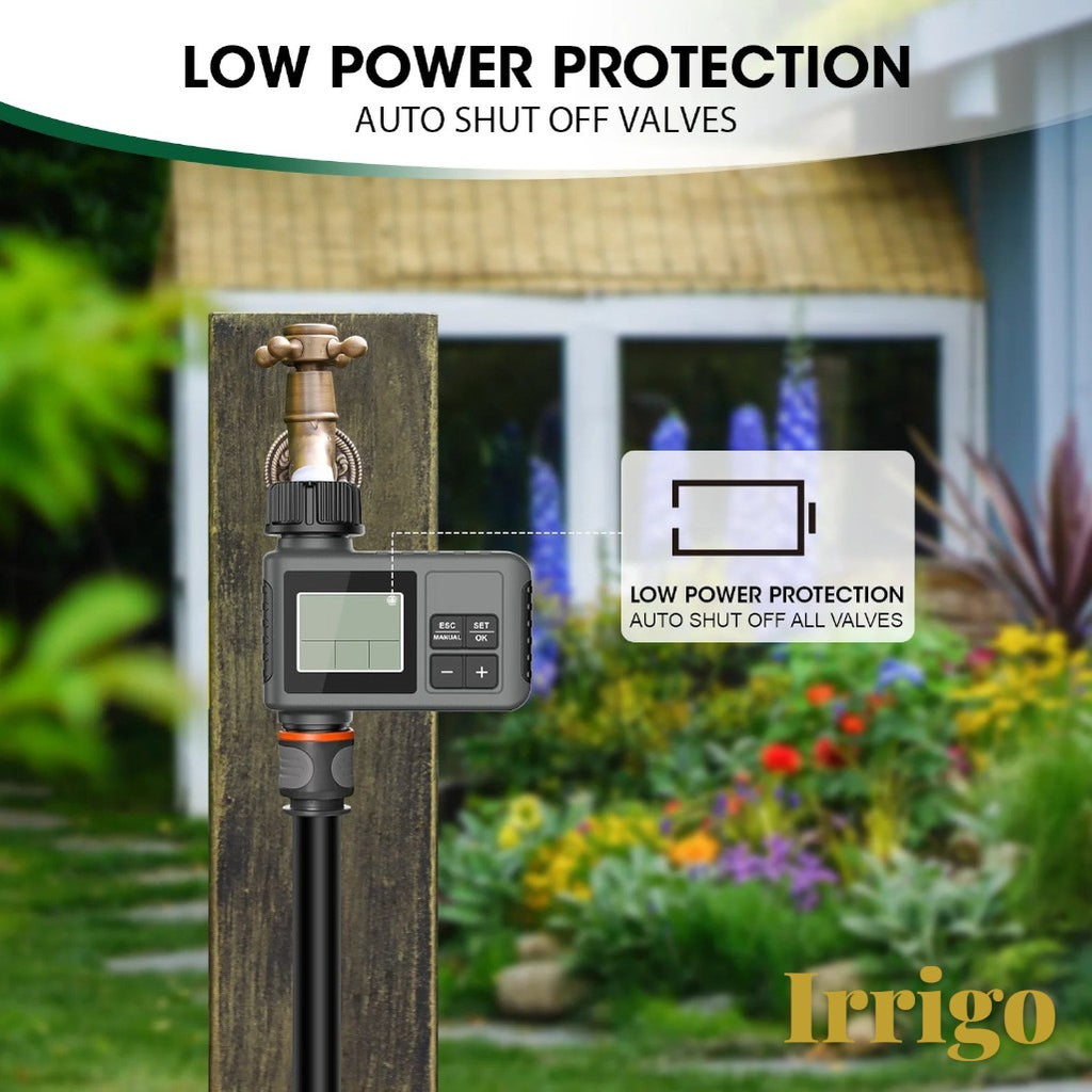 Gr8est Irrigo smart water timer attached to a garden faucet, featuring an LCD screen and low power protection alert.