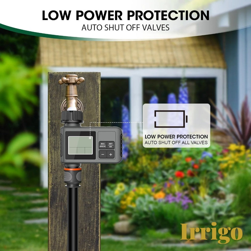 Gr8est Irrigo smart water timer attached to a garden faucet, featuring an LCD screen and low power protection alert.