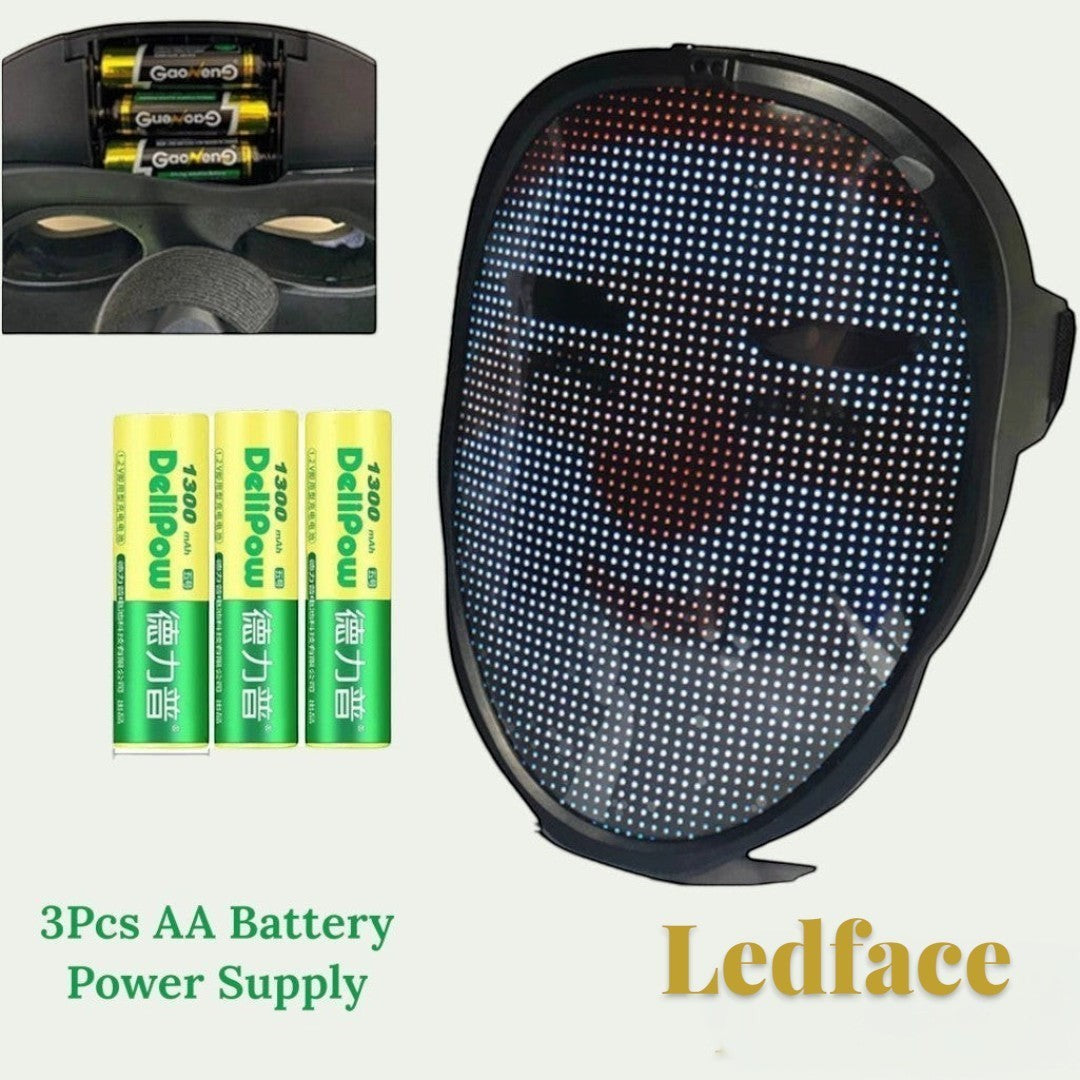 Gr8est Ledface Bluetooth RGB LED mask showing a digital face display with three AA batteries for power