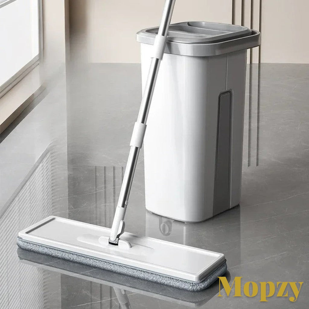 Gr8est Mopzy spin mop and bucket set with a flat microfiber mop head and grey plastic bucket for floor cleaning.