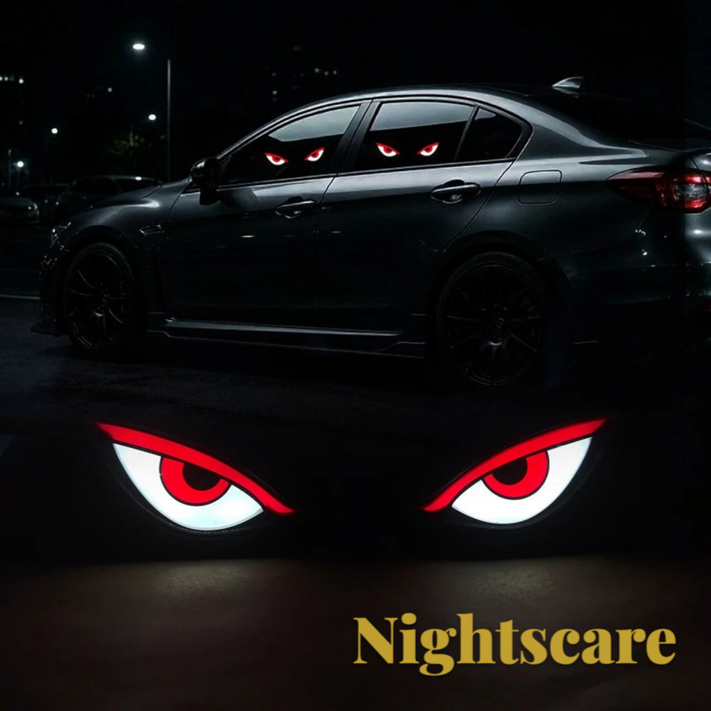 Gr8est Nightscare solar LED demon eye car window light glowing red on a dark vehicle at night