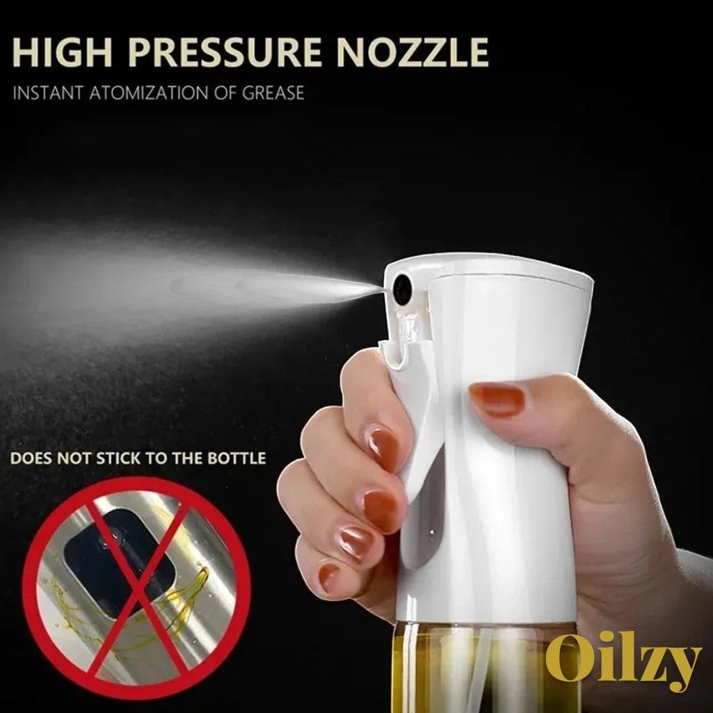 Gr8est Oilzy kitchen oil spray bottle with high-pressure nozzle creating a fine mist for even cooking oil coverage.