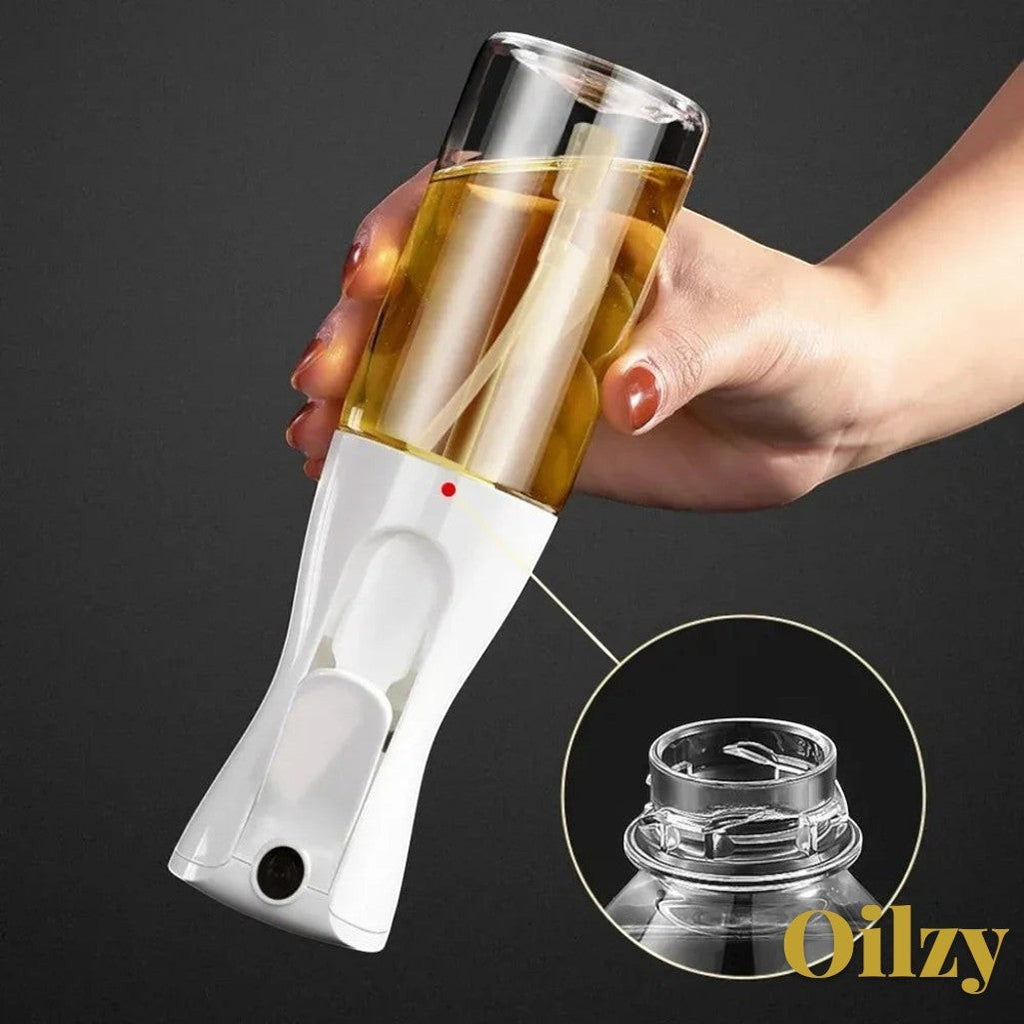 Gr8est Oilzy kitchen oil spray bottle with white handle and clear container for even misting while cooking