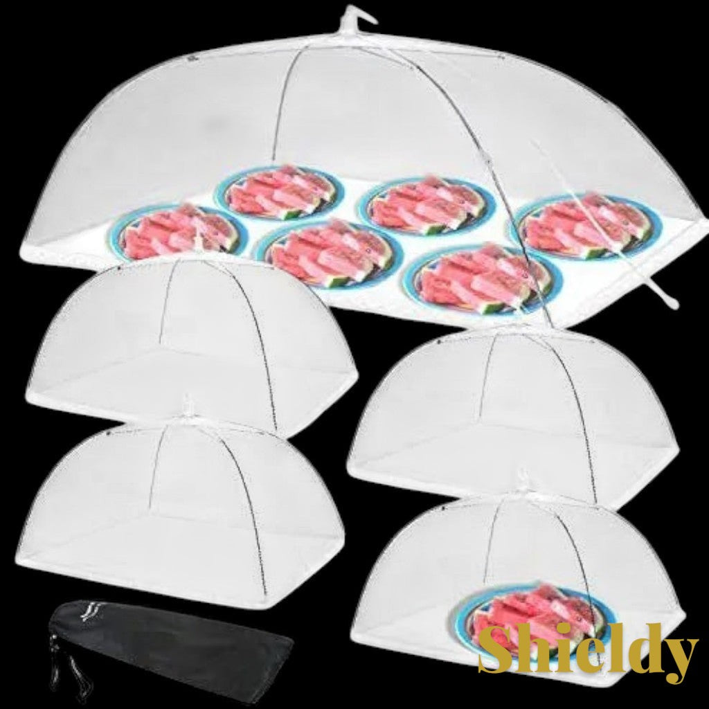 Gr8est pop-up food mesh covers protecting plates of watermelon slices from insects for outdoor picnics.