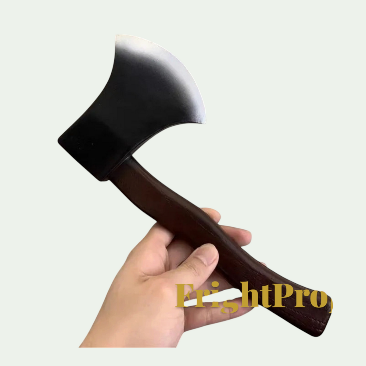 Gr8est soft PU rubber axe costume prop with a black blade and brown handle held in a hand for Halloween cosplay
