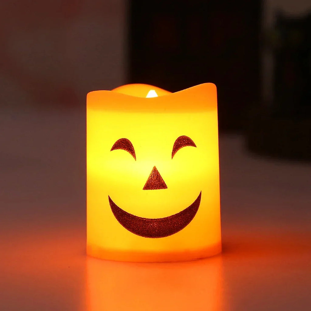 Gr8est orange-yellow LED flameless candle with a smiling jack-o-lantern face for Halloween party decor