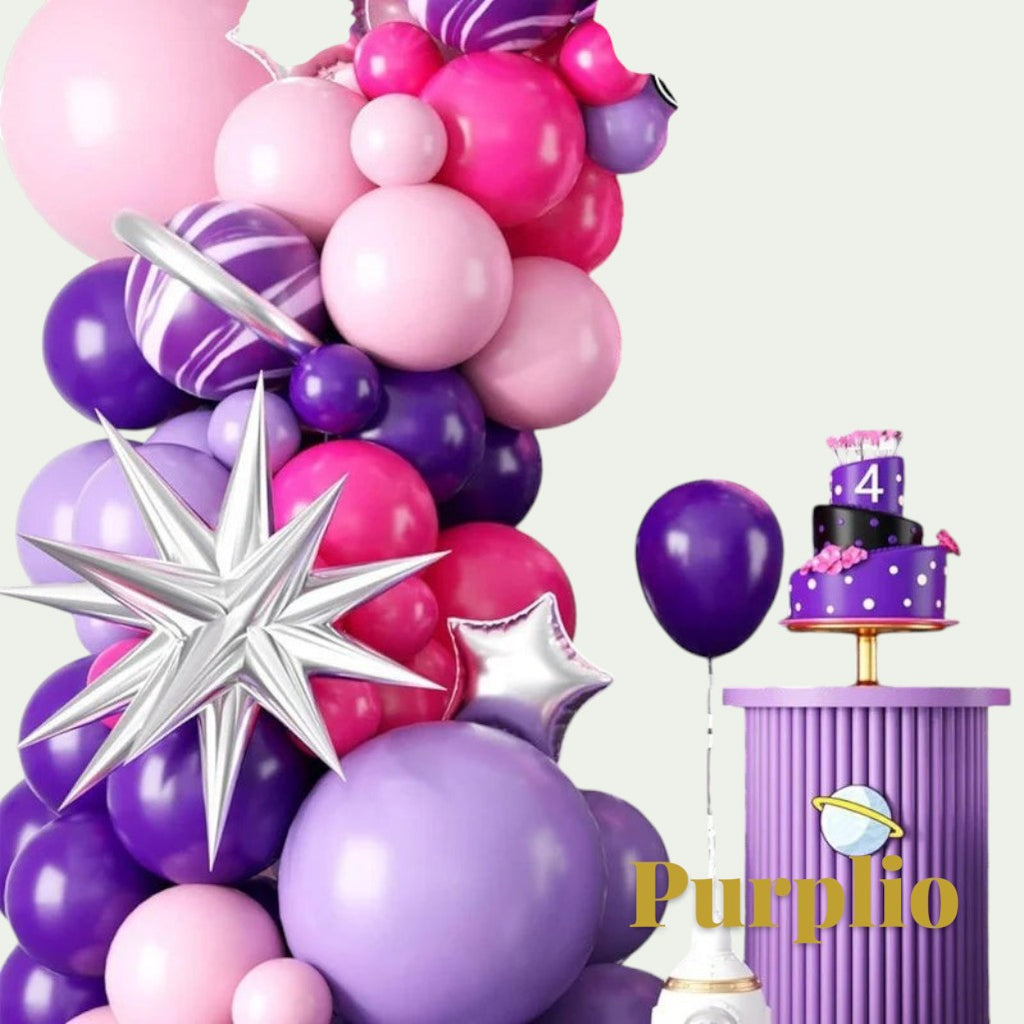 Gr8est Purplio hot pink and purple balloon garland arch kit with star-shaped balloons and a decorative cake stand.