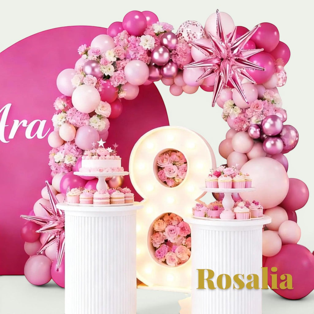Gr8est Rosalia pink balloon arch kit with star and round latex balloons decorated for a birthday party celebration.
