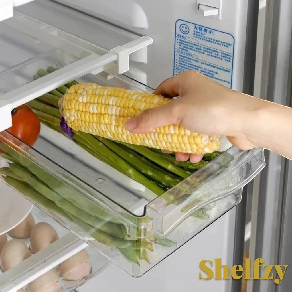 Gr8est Shelfzy clear plastic under-shelf fridge drawer holding fresh corn and asparagus for organized storage