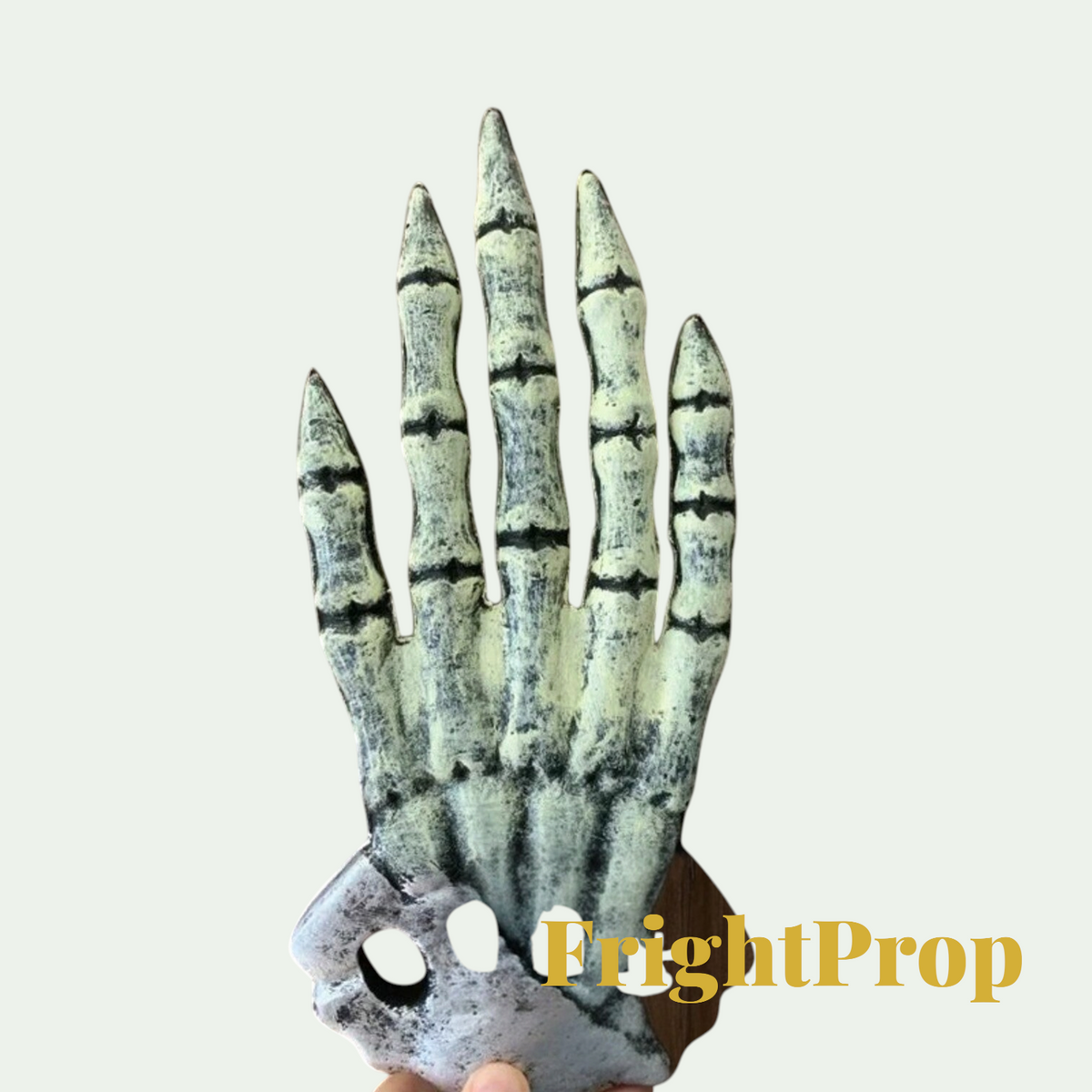 Gr8est skeleton hand prop for Halloween costumes, featuring realistic bone texture and weathered finish for cosplay