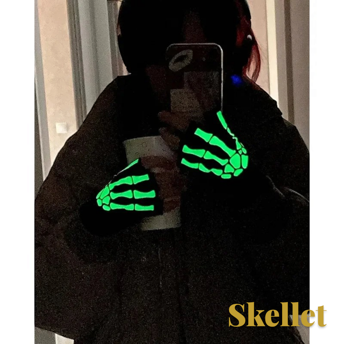 Gr8est Skellet fingerless gloves featuring a glowing green skeleton hand print on black fabric for Halloween costumes