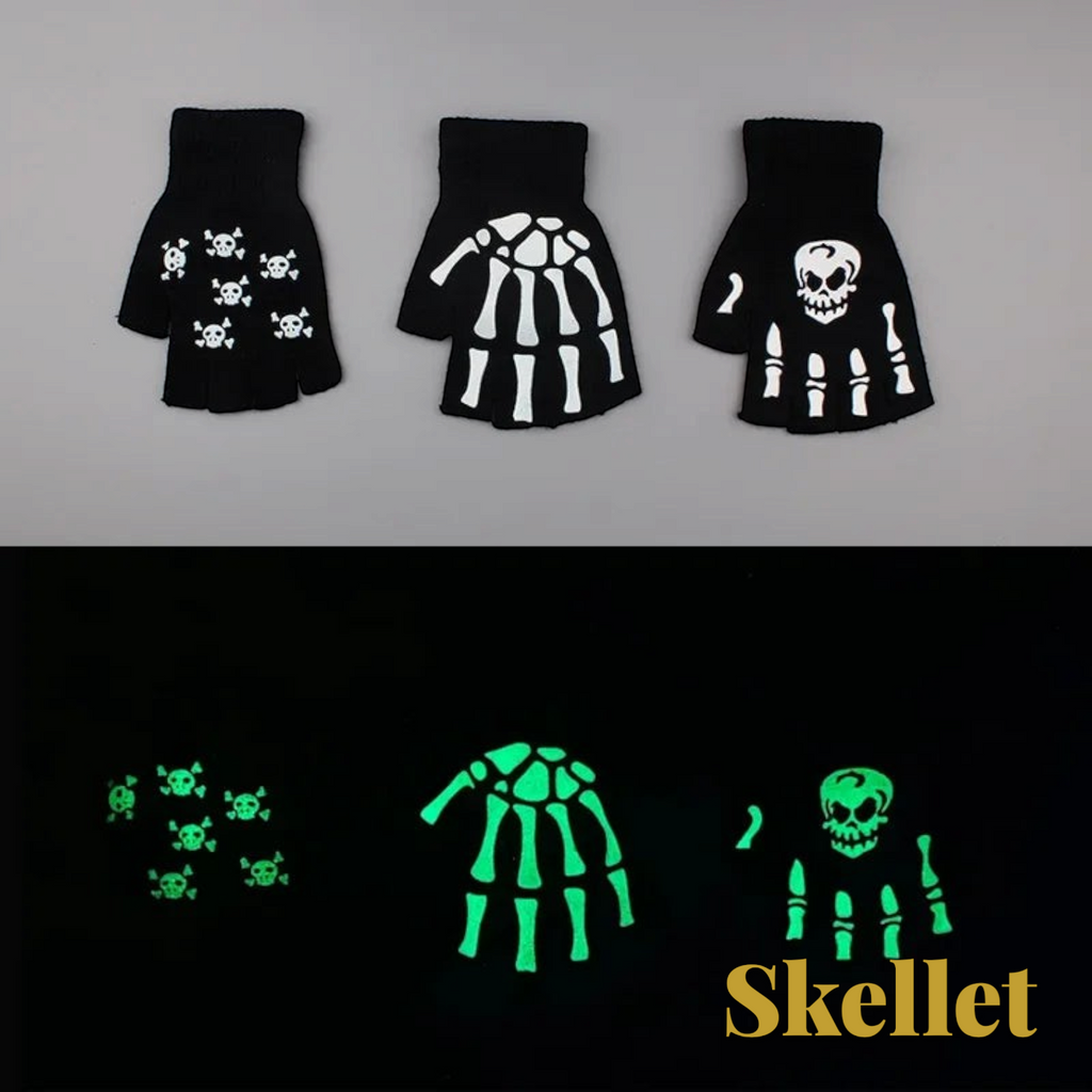 Gr8est Skellet fingerless gloves with white skeleton and skull patterns that glow in the dark on a grey background