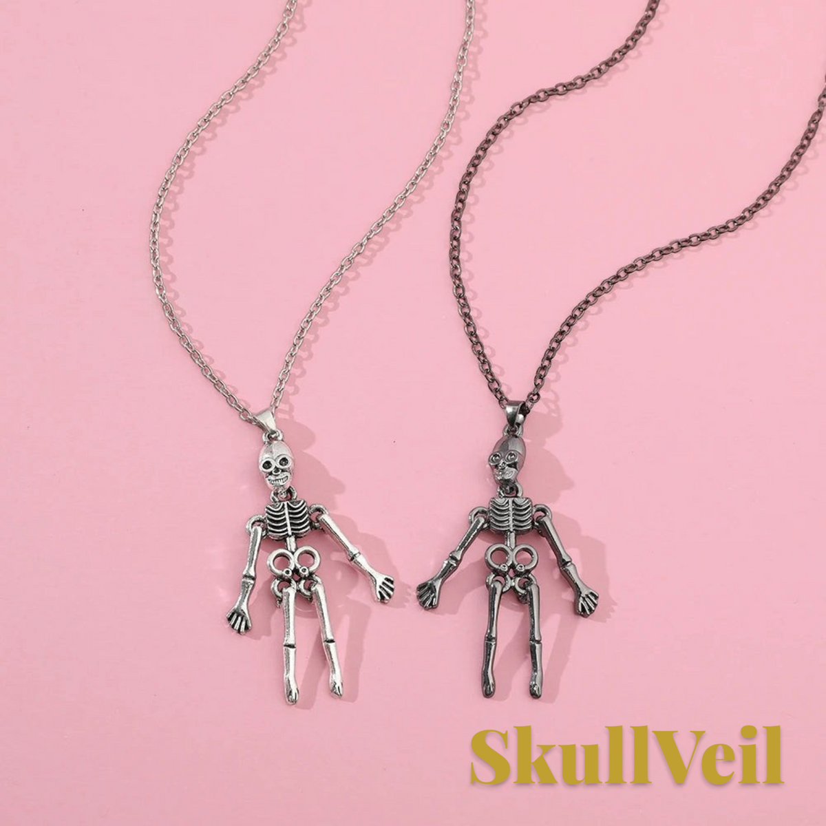 Gr8est Skullveil gothic skeleton pendant necklaces in silver and dark metal tones on a pink background