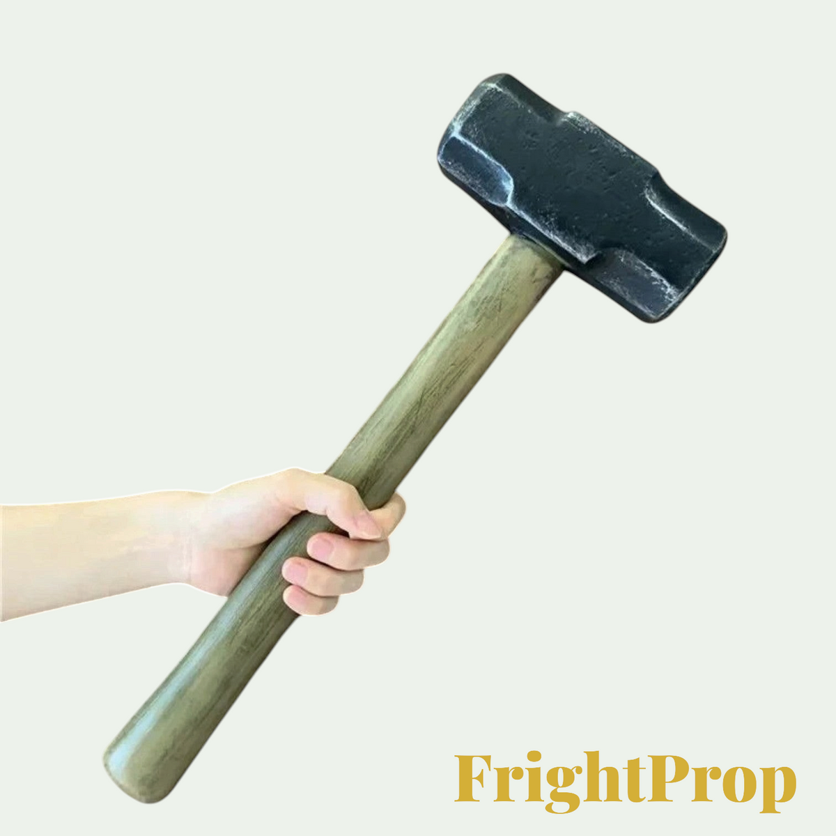 Gr8est soft PU foam sledgehammer prop held in a hand for Halloween cosplay and horror costume accessories.