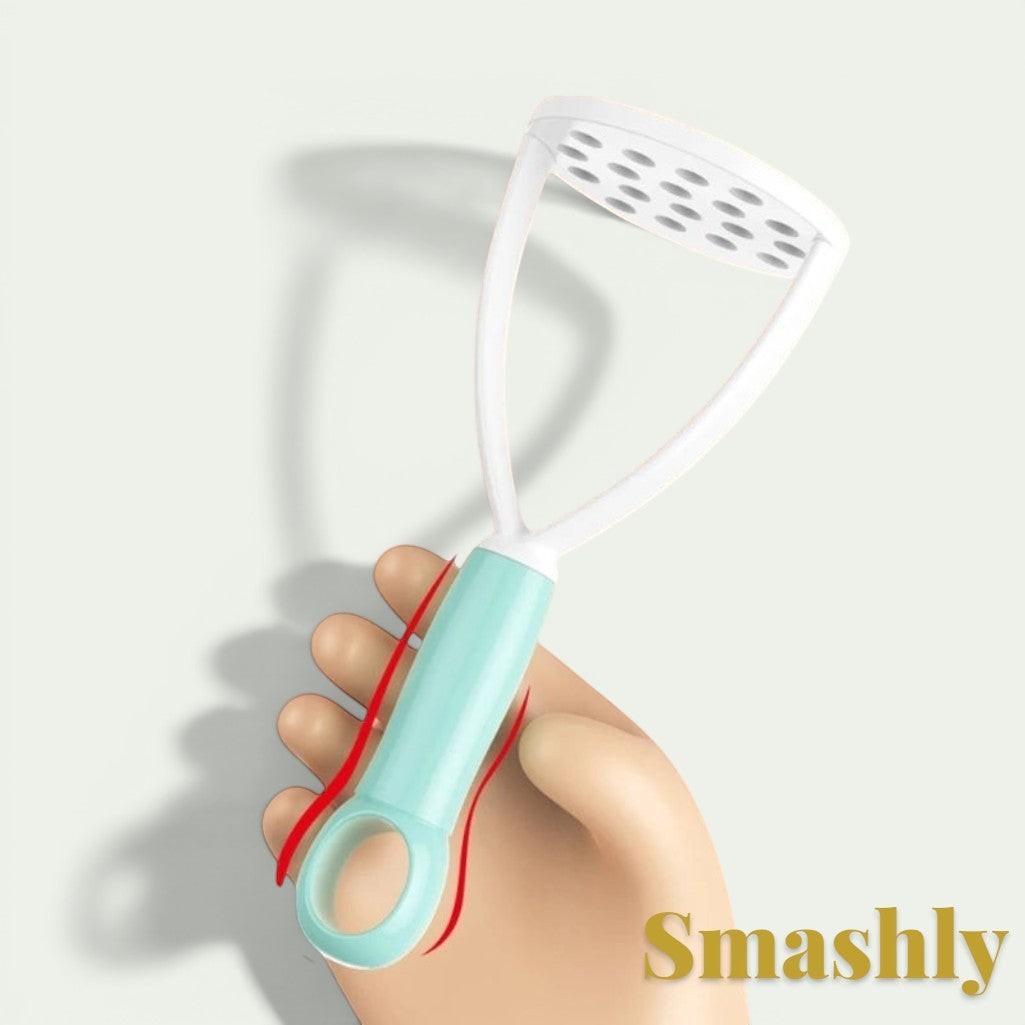 Gr8est Smashly white and mint green ergonomic plastic potato masher held in a hand for food preparation