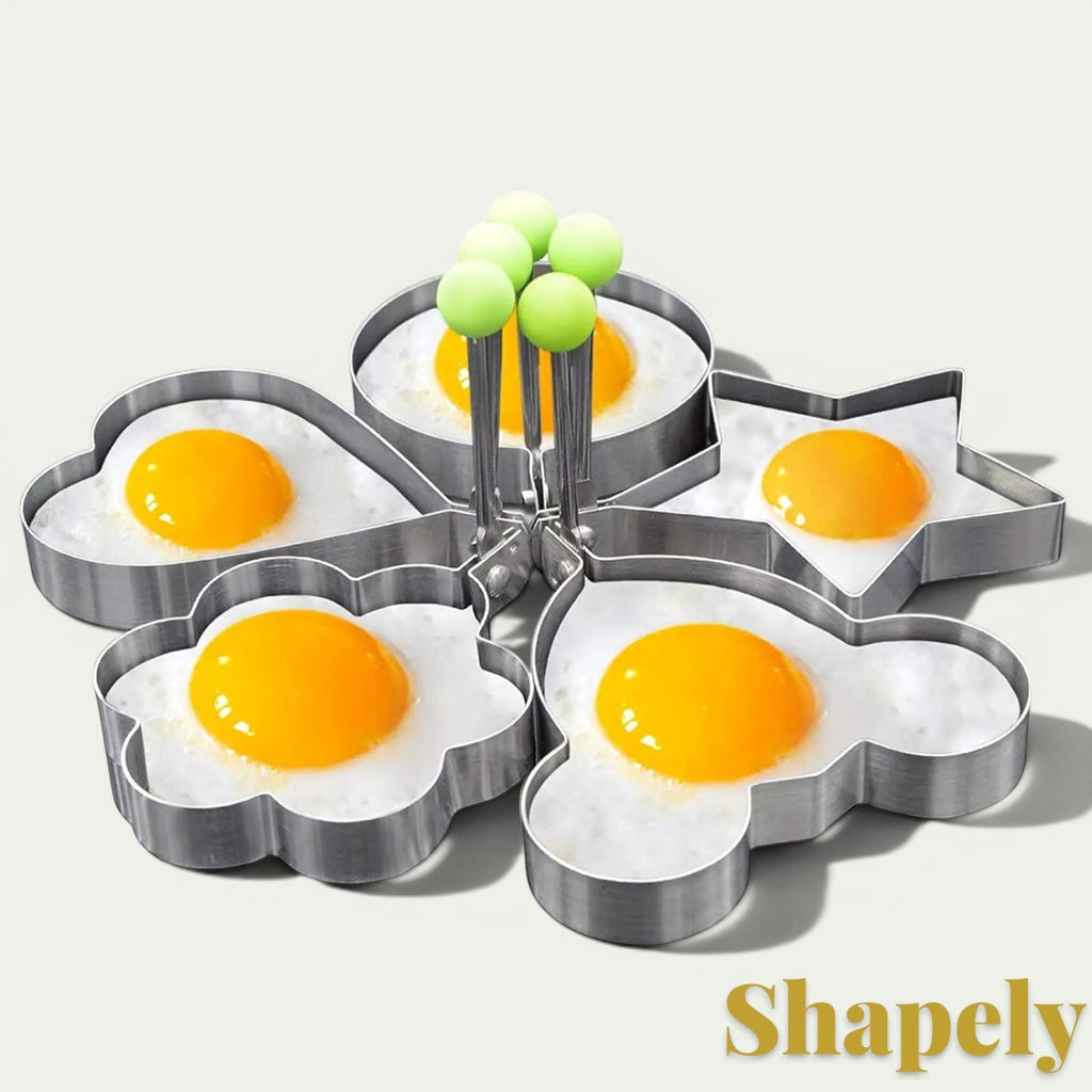 Gr8est stainless steel breakfast mold set with heart, star, flower, and mouse shapes for cooking eggs or pancakes.