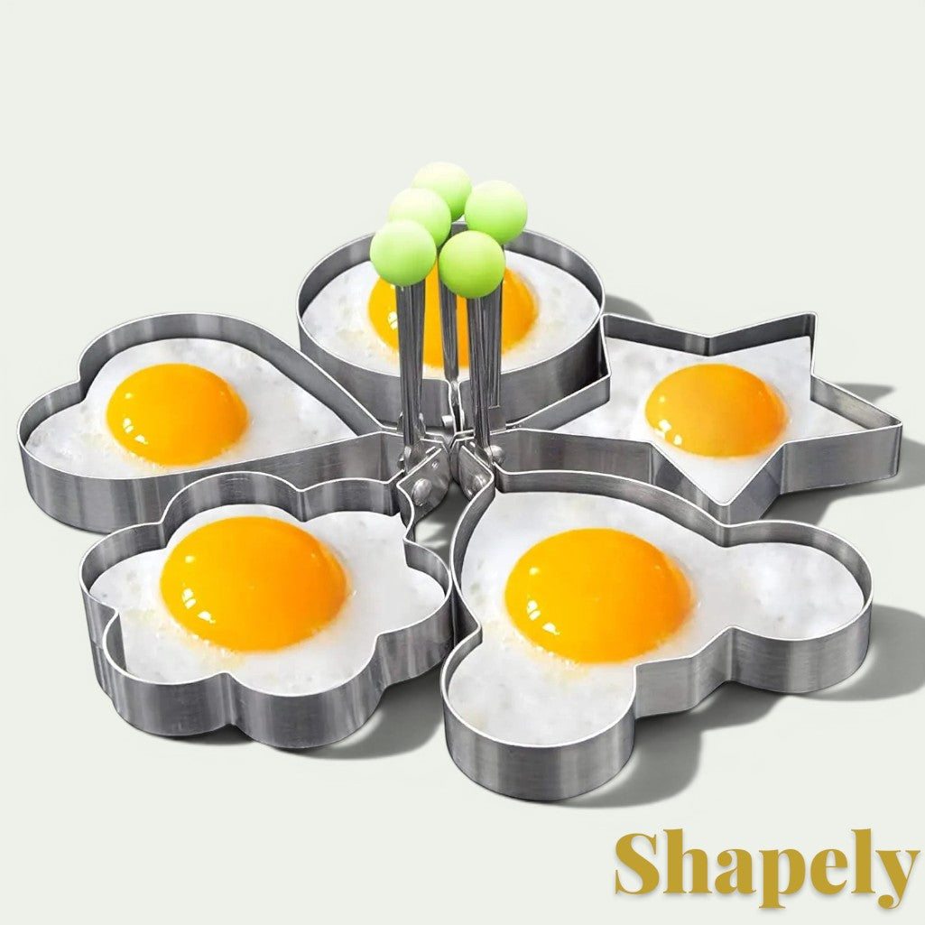 Gr8est stainless steel breakfast mold set with heart, star, flower, and mouse shapes for cooking eggs or pancakes.