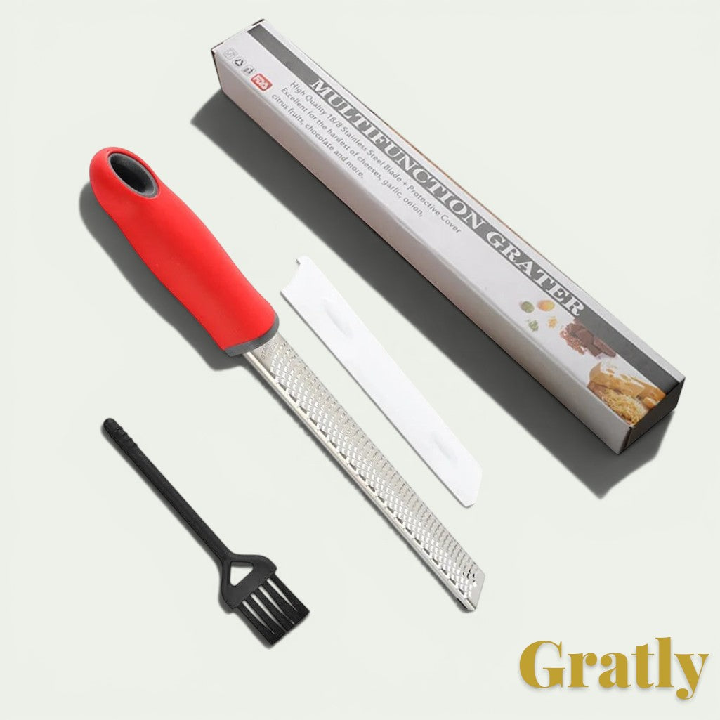 Gr8est stainless steel multi-purpose kitchen grater with a red ergonomic handle, protective cover, and cleaning brush.