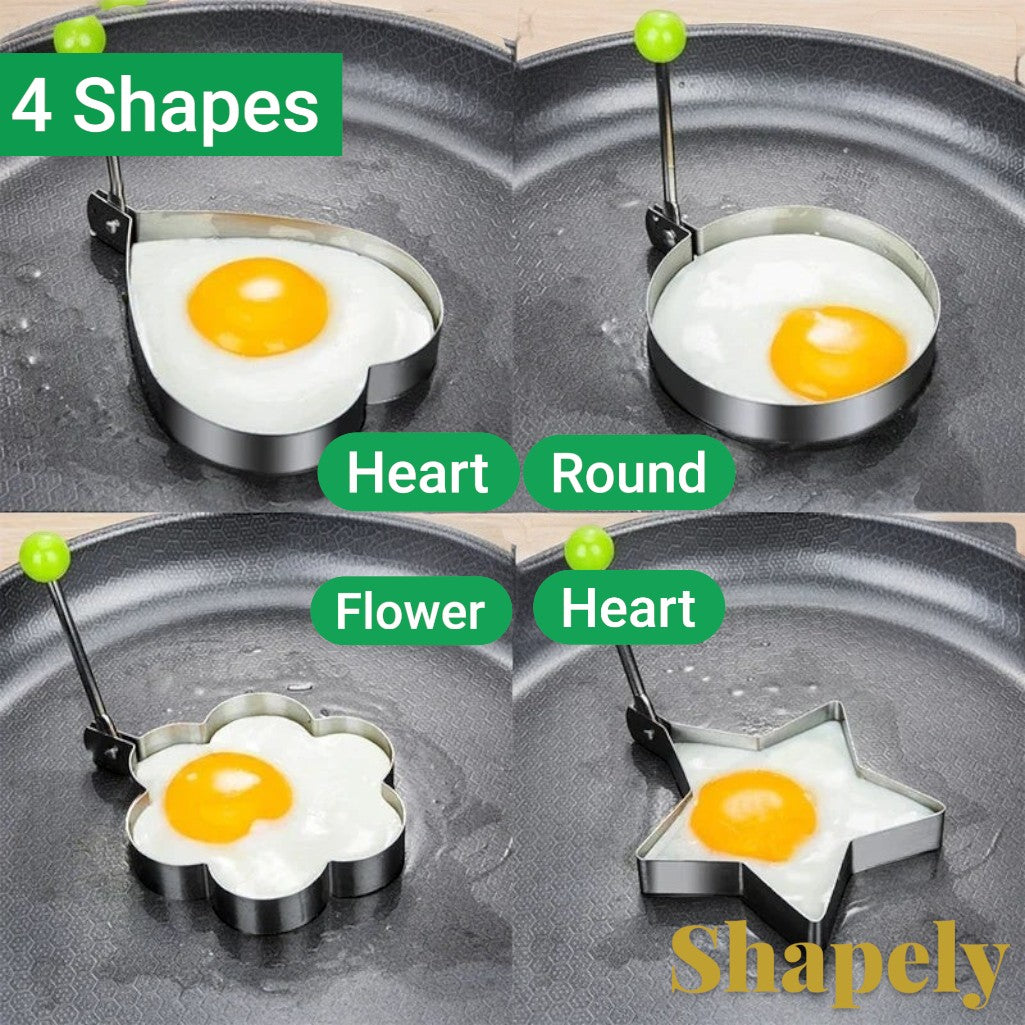 Gr8est stainless steel egg and pancake molds in heart, round, flower, and star shapes cooking in a frying pan.