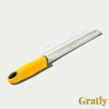 Gr8est stainless steel multi-purpose grater with a yellow ergonomic handle and protective cover for zest and cheese.